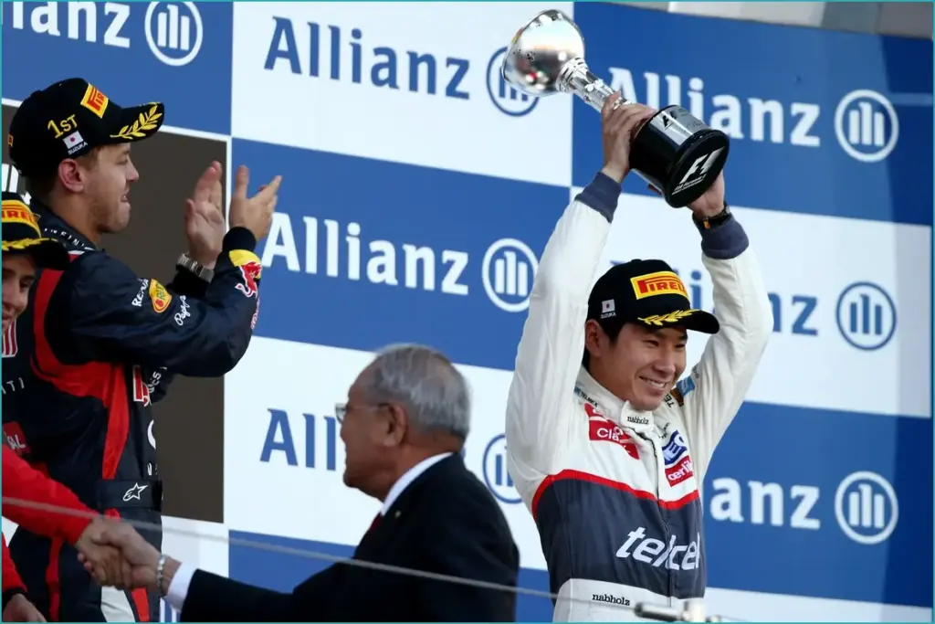 Japanese f1 drivers celebrating home podium success