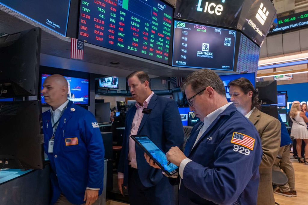 S&p 500 and nasdaq reach record highs as investors anticipate