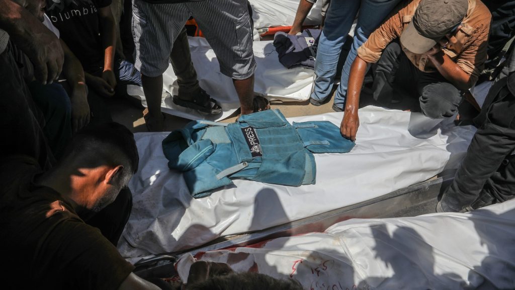 Israeli strikes target gaza hospital, claiming 22 lives including journalists