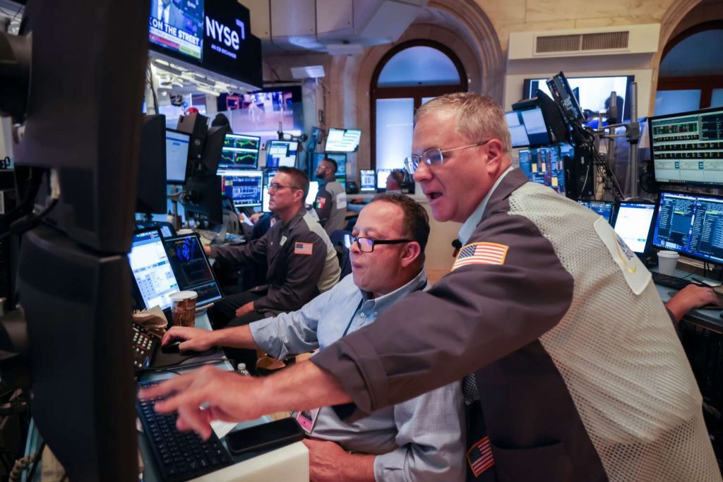 Major indexes steady near record highs as retail earnings approach