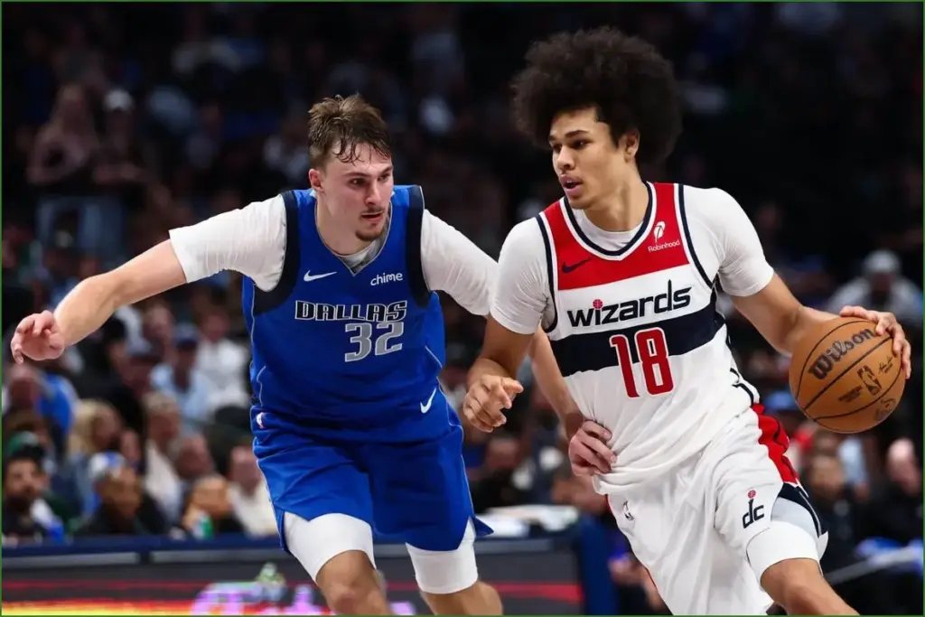 Wizards and kyshawn george stun the mavericks with relentless spirit