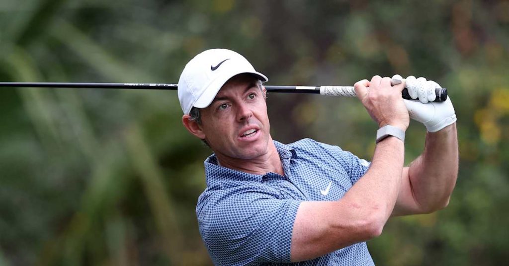 Rory mcilroy overcomes back pain to post 74 at the