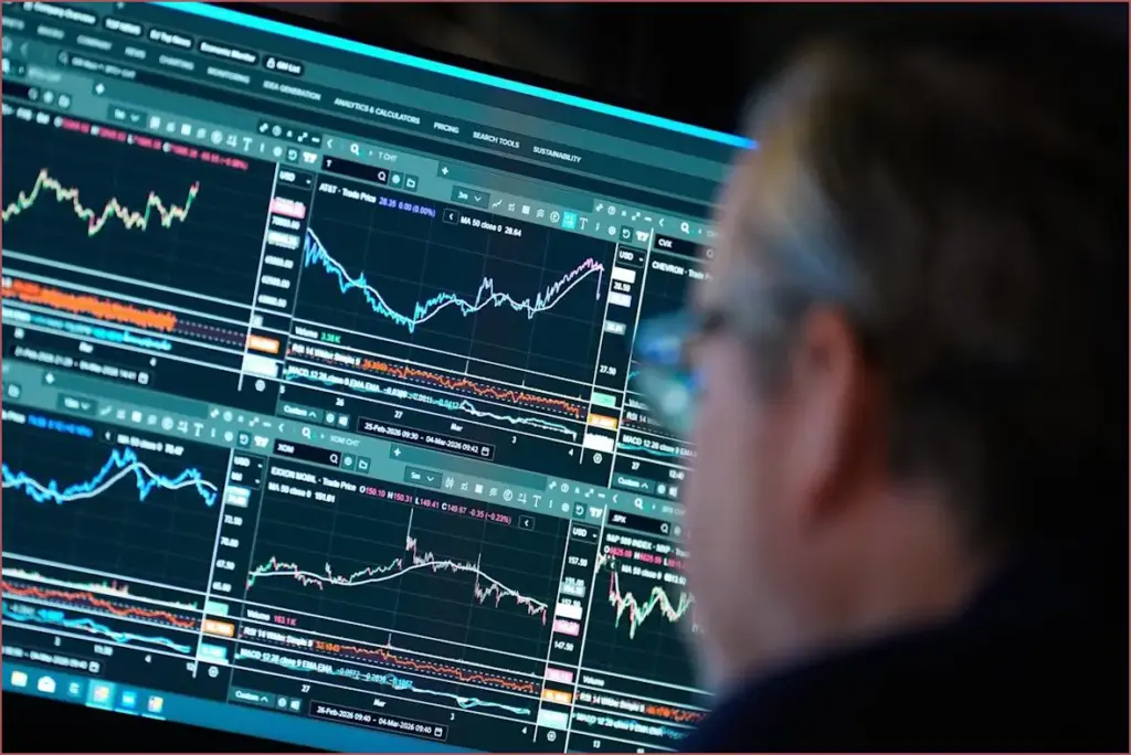 Stocks surge on positive economic news and falling oil prices