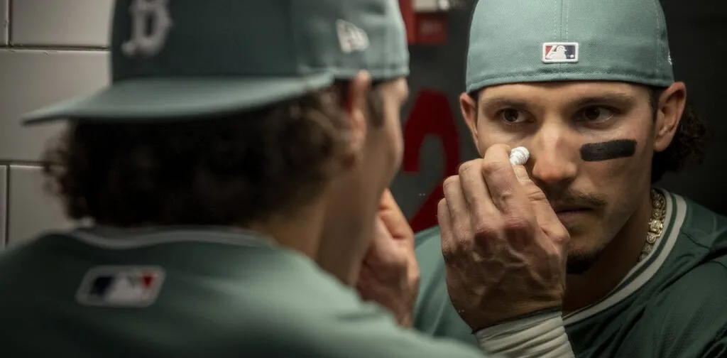 Baseball players use black marks under their eyes to reduce